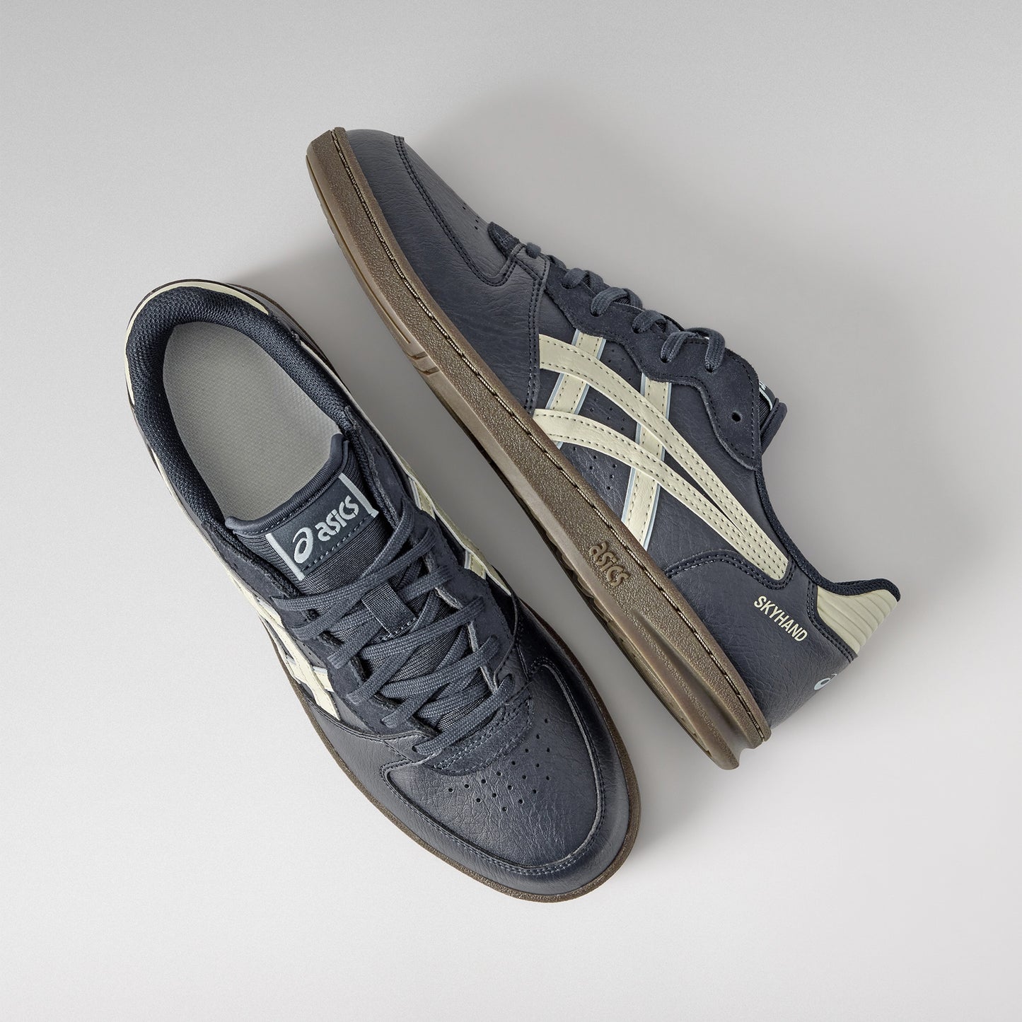 ASICS MEN SHOES SKYHAND QG MIDNIGHT/IVORY - Sole Therapy